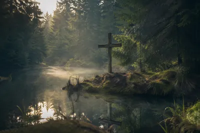 Wooden Cross Reflected in Evergreen Pond