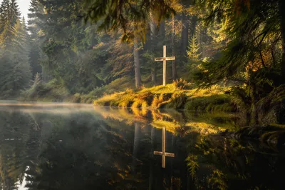 Wooden Cross Reflected in Evergreen Pond