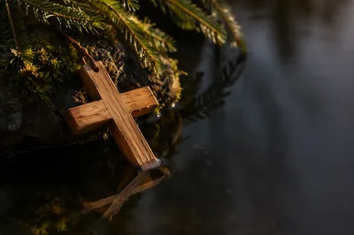 Wooden Cross Reflected in Still Water