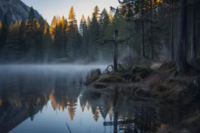 Evergreen Dawn Cross Reflected in Still Water