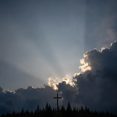 Wooden Cross Beneath Hopeful Storm Light