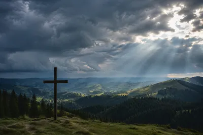 Wooden Cross Beneath Stormy Sunbeams