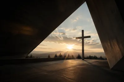 Wooden Cross with Sunset Light Rays