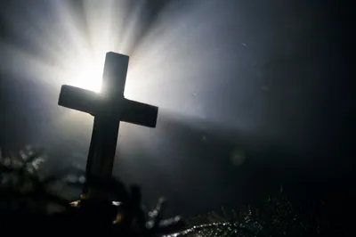 Wooden Cross with Radiant Light Rays