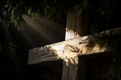 Rustic Cross with Morning Light Rays