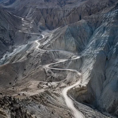 Winding Desert Canyon Path Aerial View