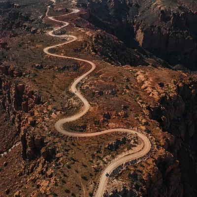 Winding Desert Road Through Rugged Canyon