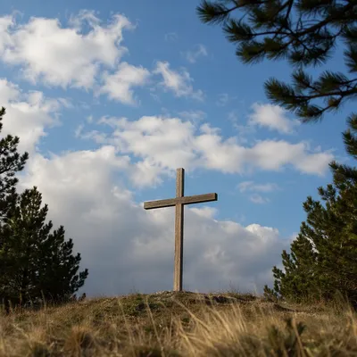 Empty Wooden Cross Under Blue Sky