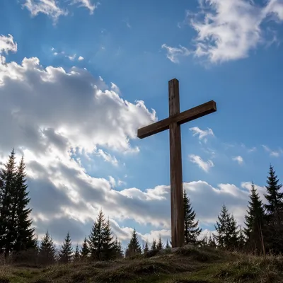 Empty Wooden Cross Beneath Blue Sky