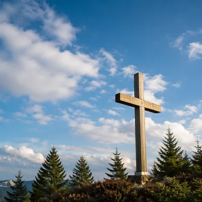 Empty Wooden Cross Under Blue Sky