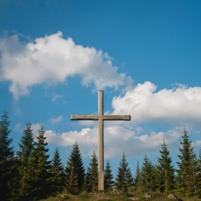 Empty Wooden Cross Under Blue Sky