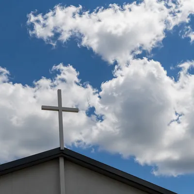 White Cross Beneath Blue Clouded Sky