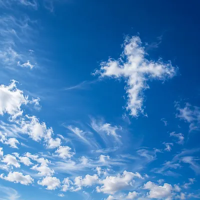 Empty Cross Cloud in Blue Sky