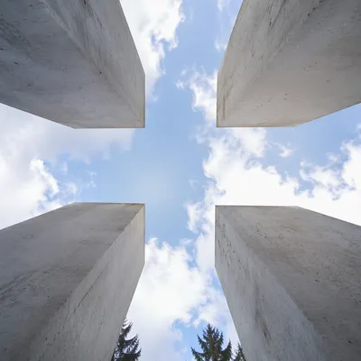 Empty Cross Opening Under Blue Sky