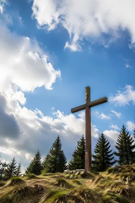 Empty Wooden Cross Beneath Blue Sky