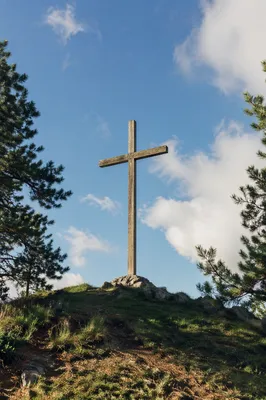Empty Wooden Cross Beneath Blue Sky