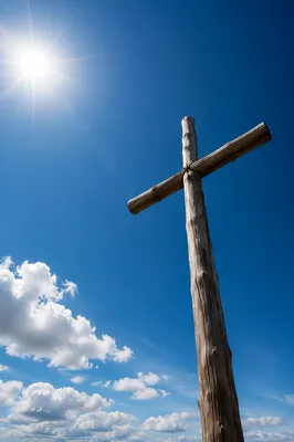 Rustic Empty Cross Beneath Blue Sky