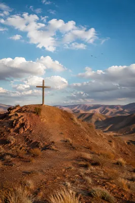 Empty Wooden Cross Under Blue Sky