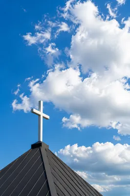 White Cross Beneath Blue Clouded Sky