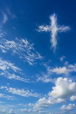 Empty Cross Cloud in Blue Sky
