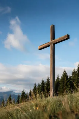 Empty Wooden Cross Under Blue Morning Sky