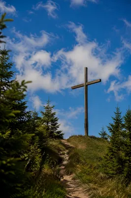 Empty Wooden Cross Under Blue Sky