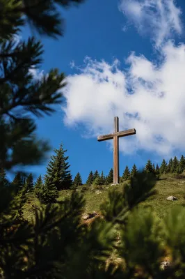 Empty Wooden Cross Under Blue Sky