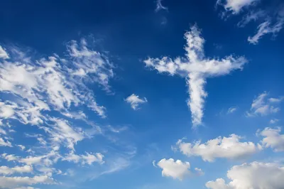Empty Cross Cloud in Blue Sky
