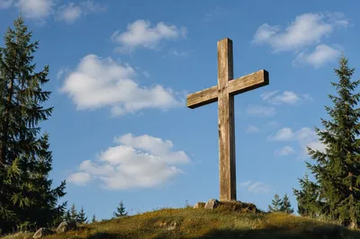 Empty Wooden Cross Beneath Blue Sky
