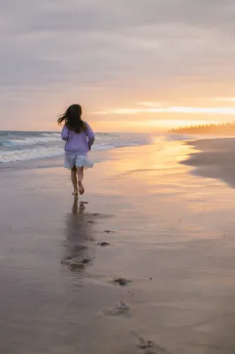 Footprints on Sunrise Shoreline
