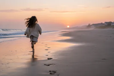 Footprints Along Peaceful Sunrise Shoreline