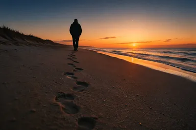 Footprints at Sunrise on Quiet Beach
