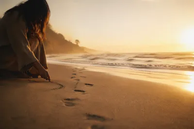 Footprints at Sunrise on Quiet Beach