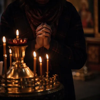 Folded Hands Prayer by Candlelight
