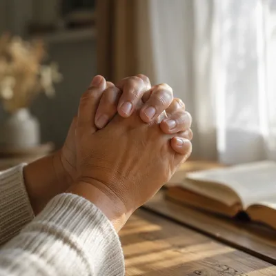 Hands Praying by Soft Morning Light