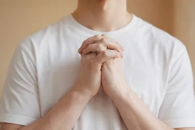 Praying Hands in Soft Daylight