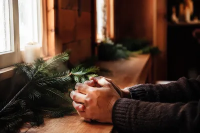 Praying Hands in Soft Chapel Light