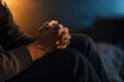 Praying Hands in Soft Cinematic Light