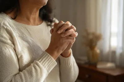 Clasped Hands in Soft Morning Light
