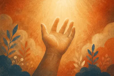 Open Hand Reaching Toward Warm Light