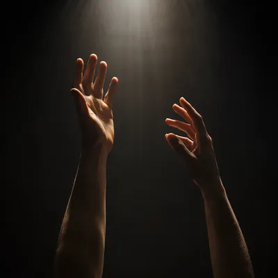 Hands Reaching Toward Hopeful Light