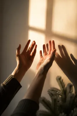 Hands Reaching Toward Sunlit Prayer
