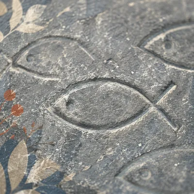Carved Ichthys Symbols on Weathered Stone