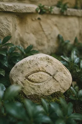 Ichthys Carving on Evergreen Garden Stone