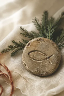 Weathered Stone Ichthys with Evergreen Sprigs