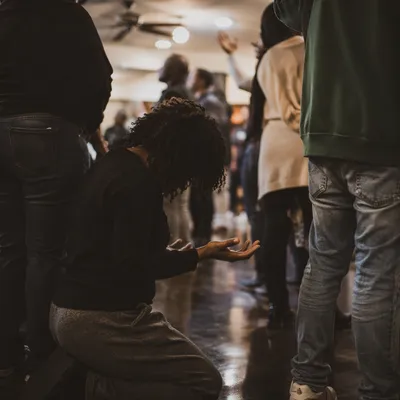 Intercessory Prayer Circle in Community Hall