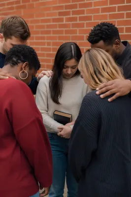 Outdoor Intercessory Prayer Circle by Brick Wall