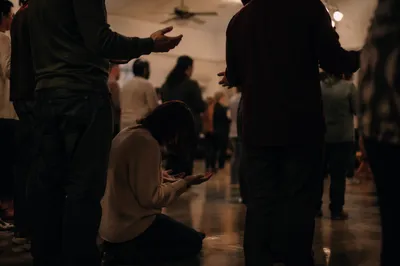 Intercessory Prayer Circle in Community Hall