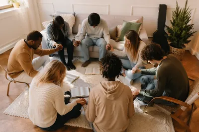 Intercessory Prayer Circle in Cozy Living Room