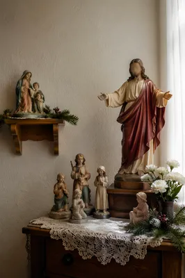 Religious Figurines on Lace Covered Table